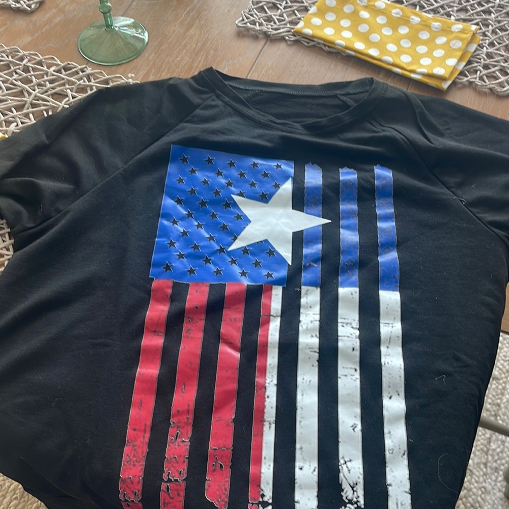 Size medium American flag long sleeve black shirt. New and Never worn.